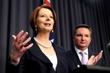 Prime Minister Julia Gillard and Immigration Minister Chris Bowen address the media in Canberra.
