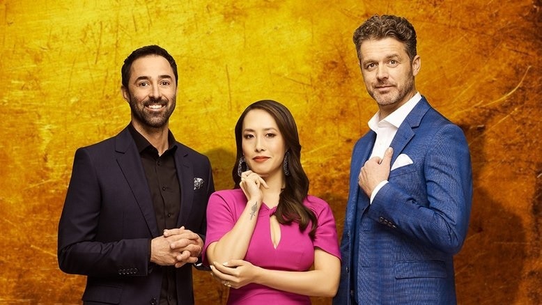 Jock Zonfrillo, Melissa Leong and Andy Allen are standing together in front of a gold screen. All are immaculately dressed.