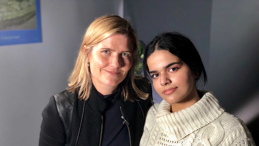 Rahaf Alqunun poses with Sophie McNeill.