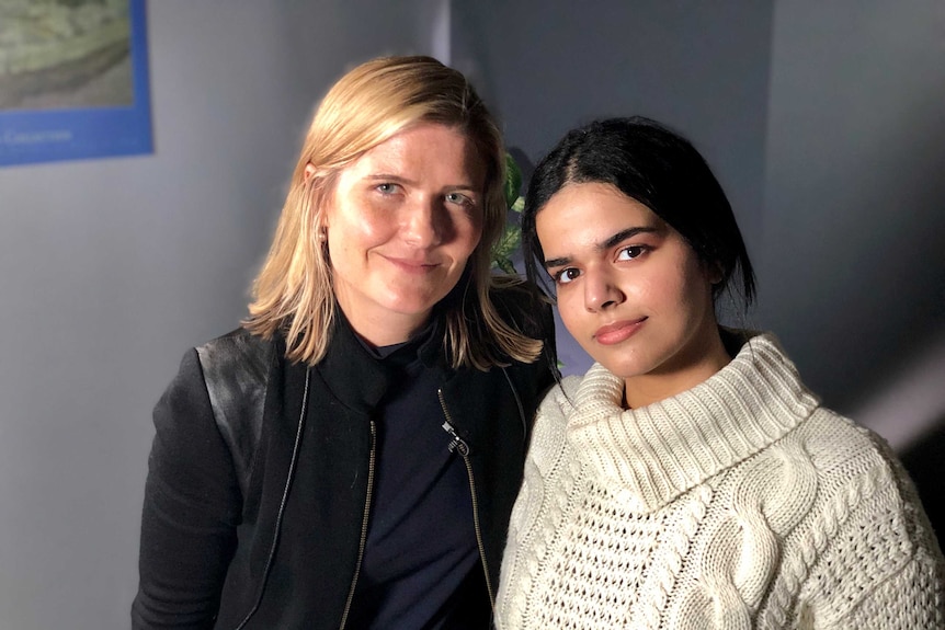 Rahaf Alqunun poses with Sophie McNeill.