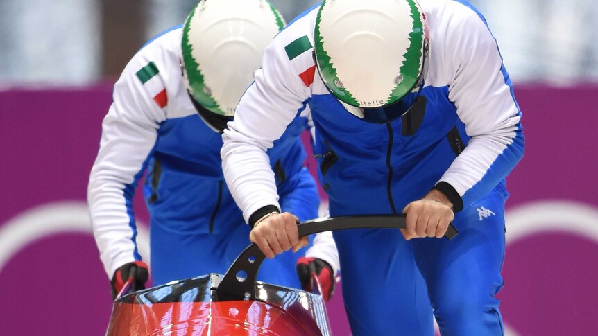Italy take a practice run in the two-man bobsleigh
