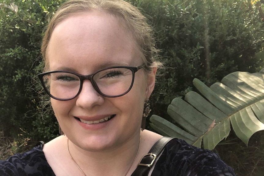 Emily McIntyre wearing glasses and her blonde hair tied back in a story about having a disability during coronavirus lockdown.