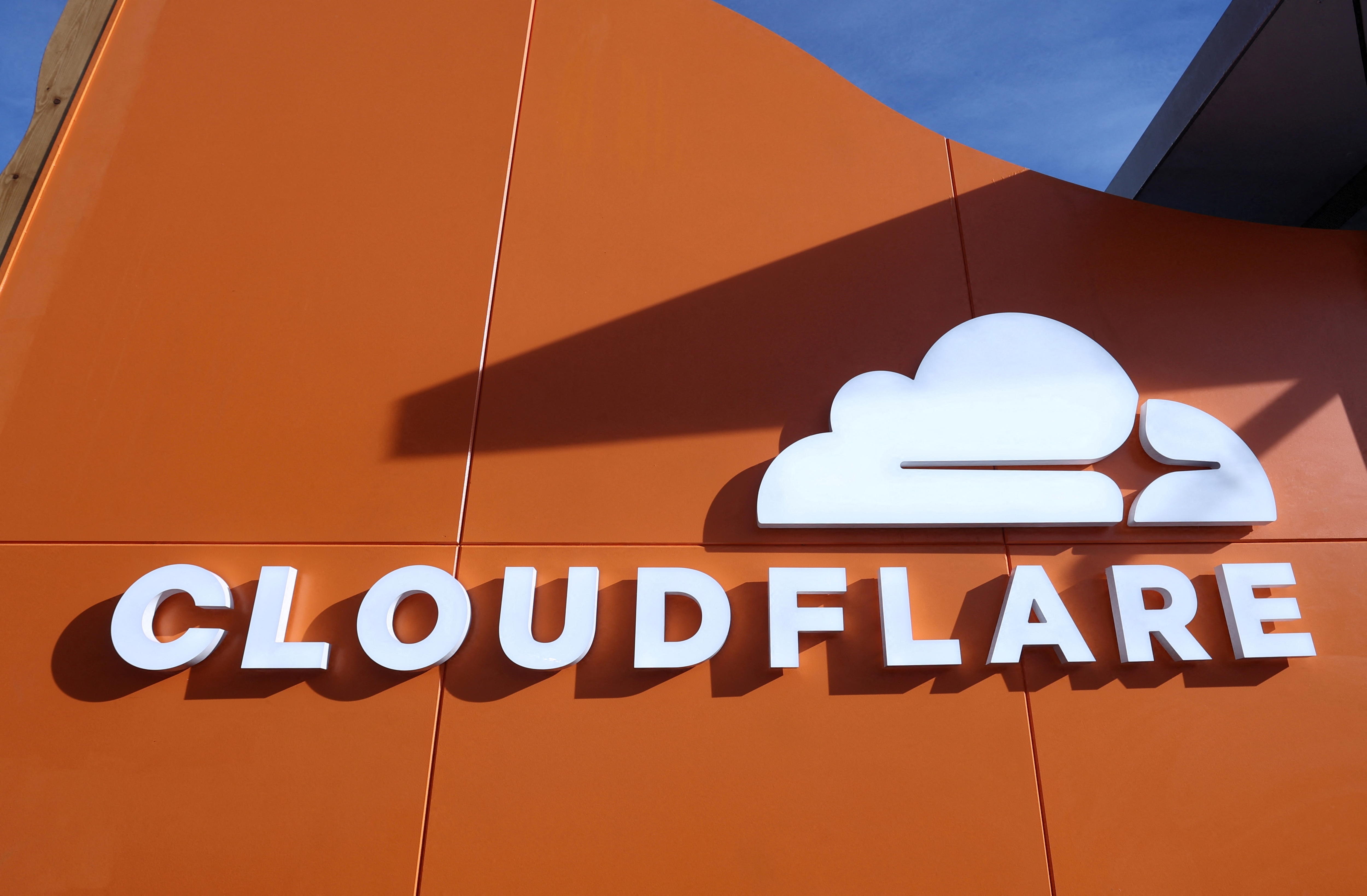 A logo of Cloudflare on an orange building