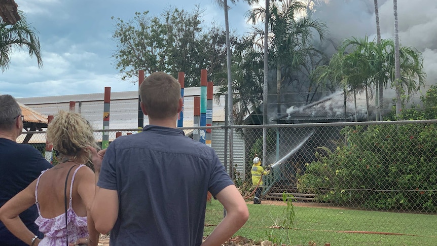 Image of residents watching on as Broome Primary School burns on Sunday afternoon.