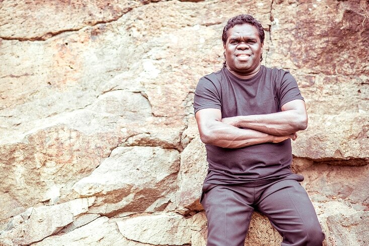 Gawurra (Stanley Gawurra Gaykamangu) near rock face