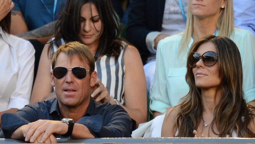 Warne and Hurley watch on