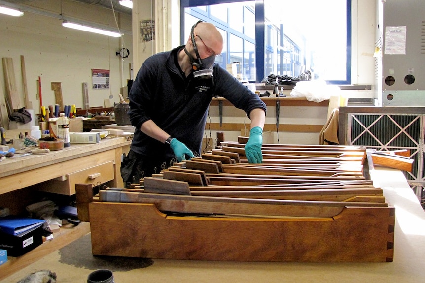 A man works on St Peter's Cathedral