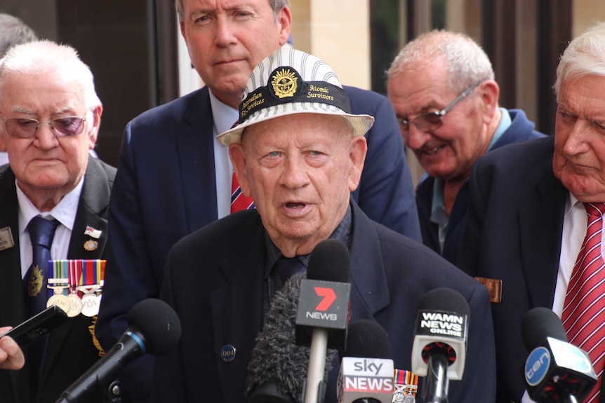 Montebello Islands nuclear testing survivor Jim Marlow talks to the media outside WA Parliament.