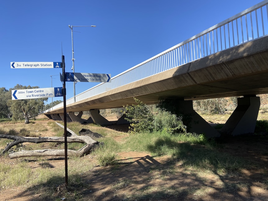 A concrete walkway crossing a dry riverbed in Alice Springs.