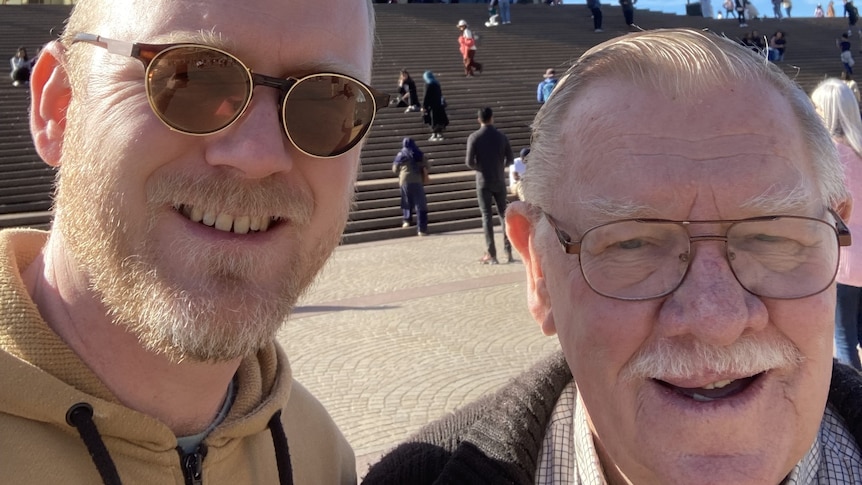 Victor Shaw with father Alex in front of Sydney Opera House.