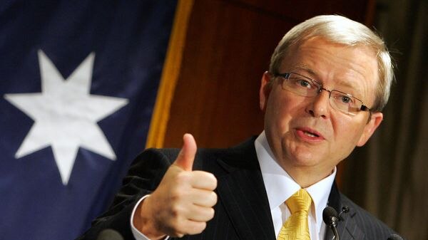ALP leader Kevin Rudd gestures while speaking at a summit.