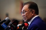 Malaysian opposition leader Anwar Ibrahim speaks during a press conference.