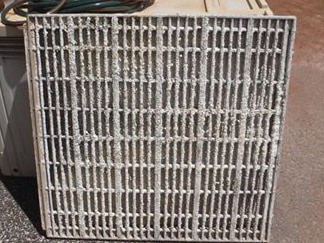 Scale build-up on air conditioning pad