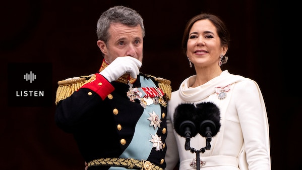 A man in military dress wipes his face . Has Audio.