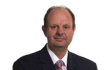 A corporate head shot of Energy Infrastructure Commissioner Andrew Dyer.