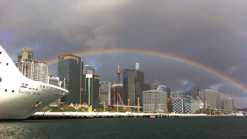 A rainbow hangs over Sydney