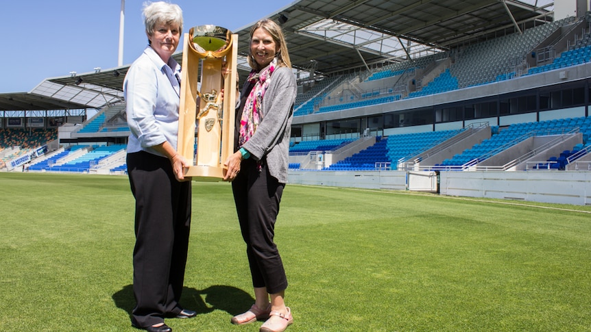 Myree Willliams and Elspeth Wishart display trophy