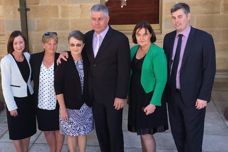 Yvette D'Ath, Ms Split, the Pullens, and Labor MPs at parliament for the law's passing.