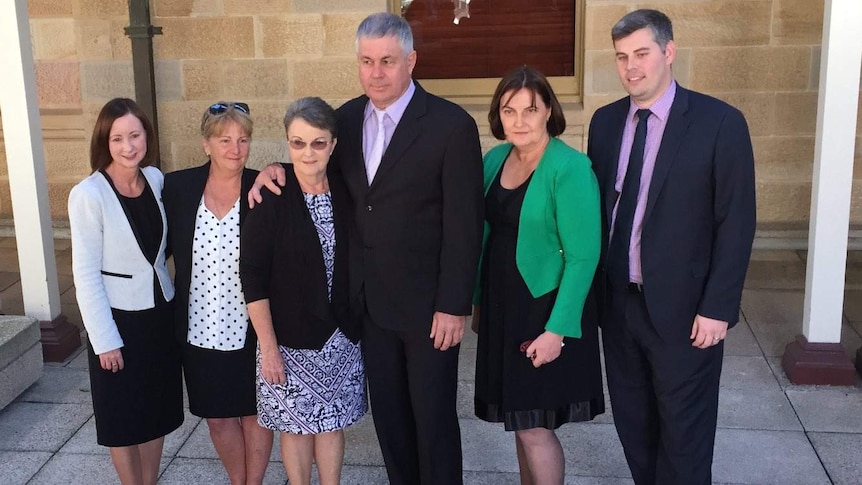Yvette D'Ath, Ms Split, the Pullens, and Labor MPs at parliament for the law's passing.