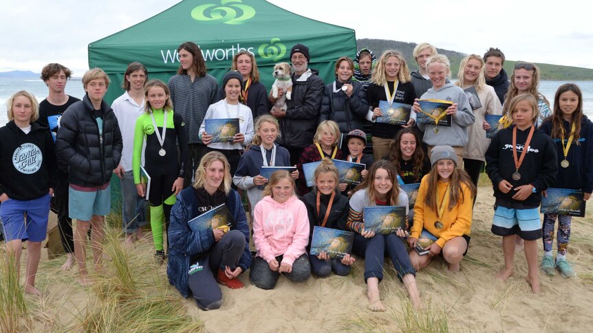 Mick Lawrence and junior surfers