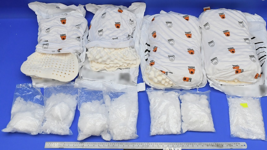 Methamphetamine pictured next to pillows