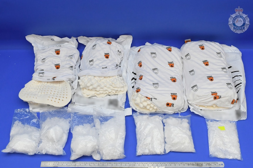 Methamphetamine pictured next to pillows