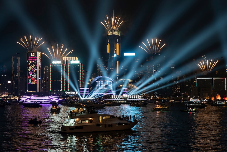 Fireworks are seen over Victoria Harbour at midnight on New Years.
