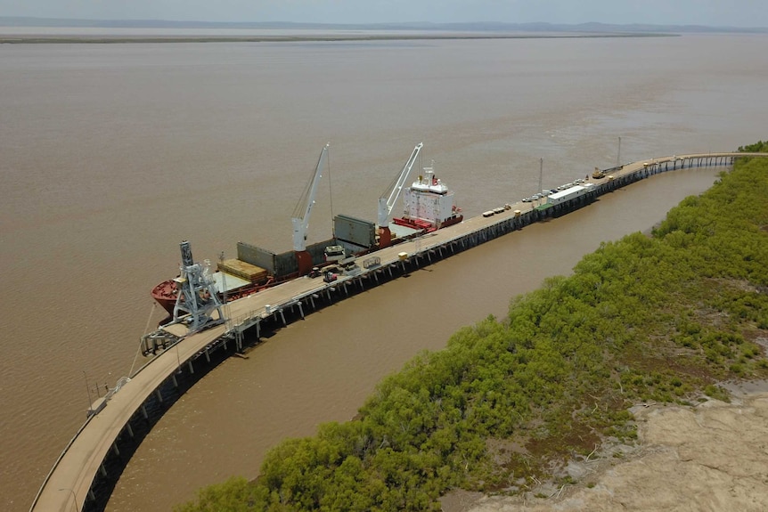 Aerial picture of a port with bulk carrier at the wharf