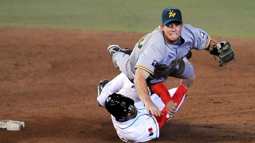 Australian Daniel Berg (R) put out in second base to the Mexican Adrian Gonzalez