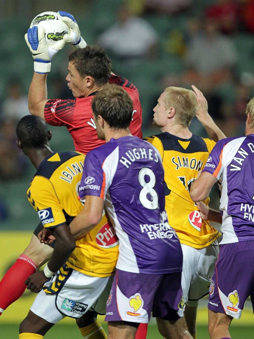 Vukovic collects the ball against the Mariners