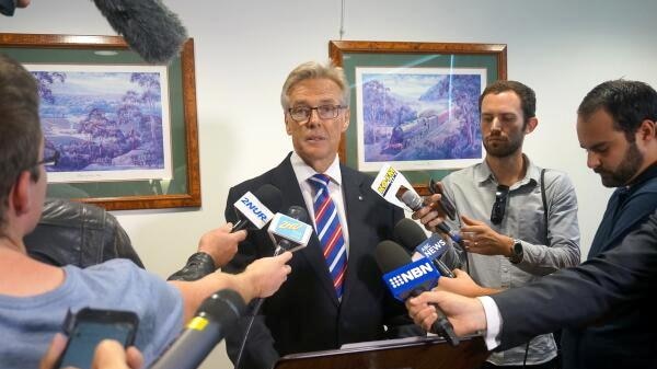Newcastle Liberal MP Tim Owen announcing he won't recontest the 2015 state election.