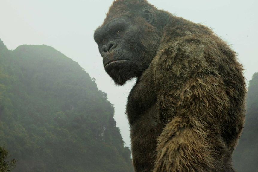 Kong stands amid mountains on Skull Island in a scene from the new film.