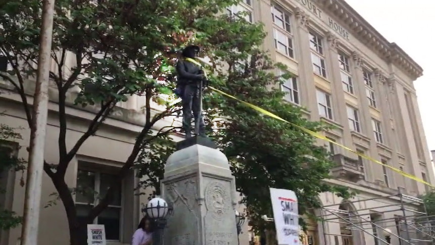 Protesters in North Carolina tear down Confederate statue