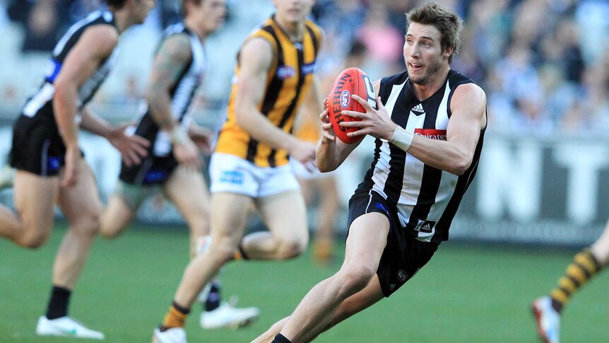 Dale Thomas in action for Collingwood against Hawthorn in round 17, 2012.