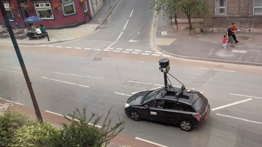 Google's vehicles drive through Australian neighbourhoods taking photos for the Street View service