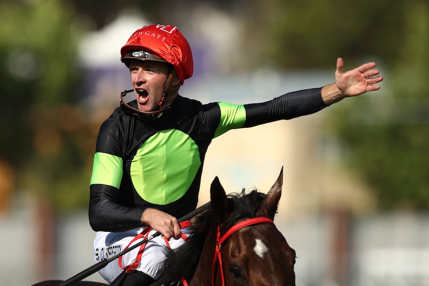 Sam Clipperton celebrates on Think About It