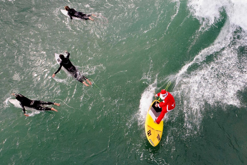 Hang ten with Santa