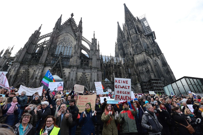 People demonstration against violence against women in front of the Cologne cathedral