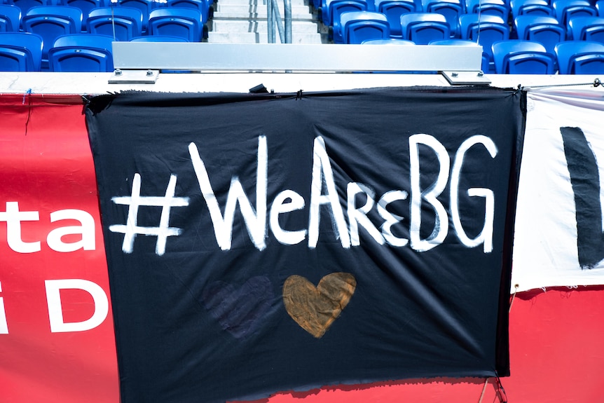 A fan banner saying "WeAreBG" in support of detained WNBA player Brittney Griner
