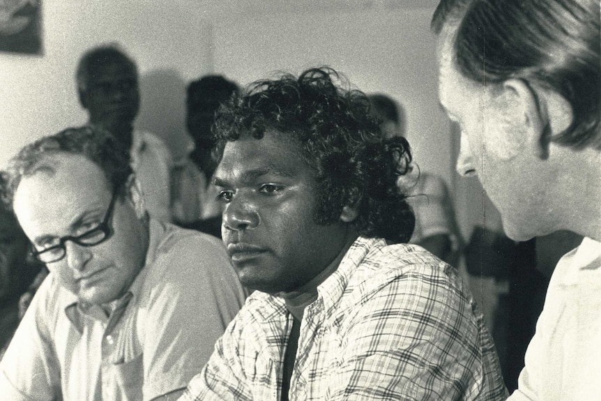 An old photo of solicitor Eric Pratt, then-NLC Chairman Galarrwuy Yunupingu and Minister for Aboriginal Affairs Ian Viner.