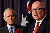 Malcolm Turnbull and George Brandis speak at a press conference after the legislation was introduced.