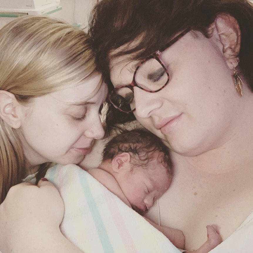 Rebecca and Isabelle Sutherland with newborn son