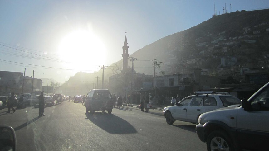 The sun shines over a busy street scene in the Afghan capital, Kabul.