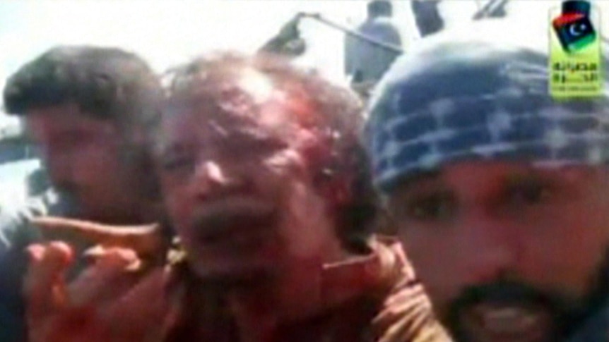 Bloodied Moamar Gaddafi is captured