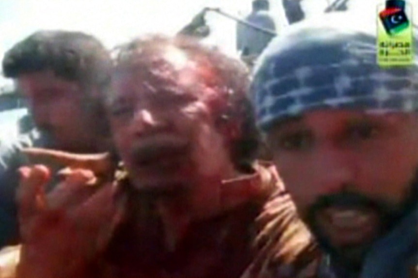 Bloodied Moamar Gaddafi is captured