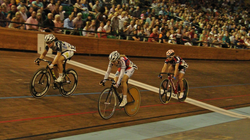 Tasmanian cyclist Amy Cure crosses the finish line