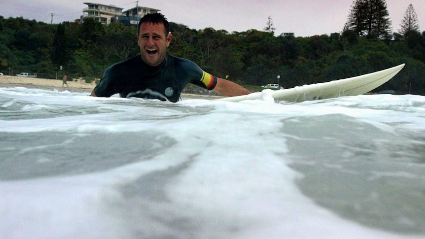 The moment Andy King goes surfing wearing a waterproof cochlear device for the first time.