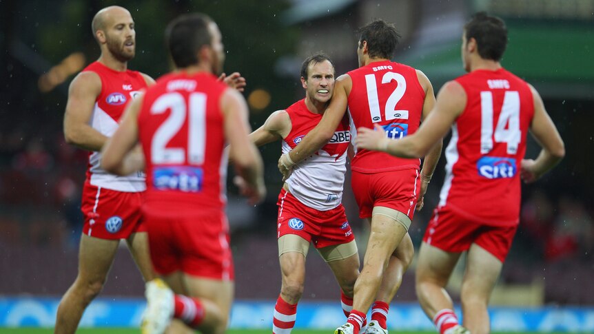 One of many goal celebrations for the Swans on Sunday at the SCG.