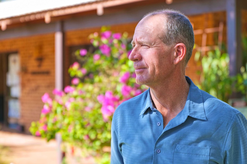 A side profile photo of a man