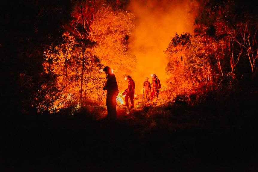 Rural firefighters are sent out to mark the fire line ahead of fire.